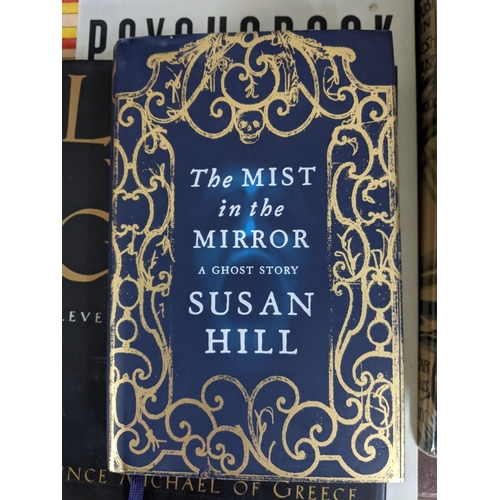 374 - A collection of books on ghosts, novels, witches and other related books to include Susan Hill novel... 