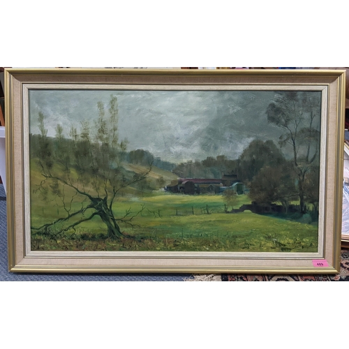 489 - Dennis Syrett - Oil on canvas depicting a country landscape, signed and dated 1973 to the lower righ... 