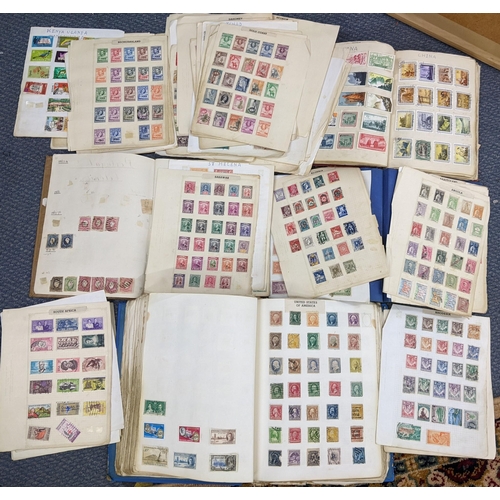 499 - Three albums and loose pages of 19th century and later mixed stamps from around the world to include... 