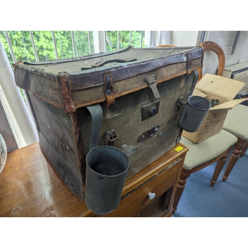 502 - A vintage canvas trunk A/F, 50cm x 40cm with initials NLF to top, along with a wooden barrel with ha... 