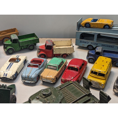 503 - A group of mostly Dinky toys to include Dinky Bedford tipper, Connaught, Cunningham C-5R, TV Roving ... 