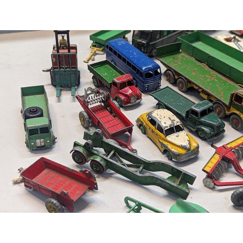 503 - A group of mostly Dinky toys to include Dinky Bedford tipper, Connaught, Cunningham C-5R, TV Roving ... 