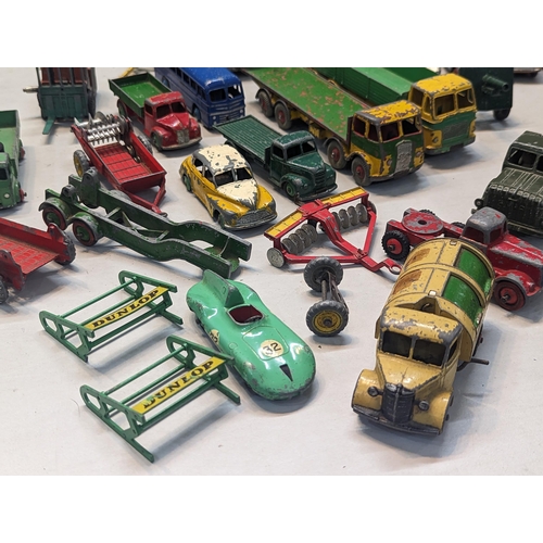 503 - A group of mostly Dinky toys to include Dinky Bedford tipper, Connaught, Cunningham C-5R, TV Roving ... 