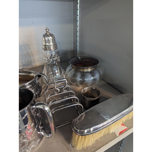 399 - Silver to include a sugar caster, brush dressing table pot, a napkin ring and silver plate
Location:... 