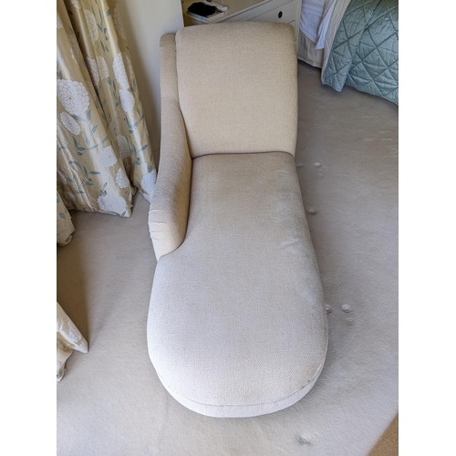 296 - A modern chaise longue upholstered in an oatmeal fabric on turned legs
Location: RAB