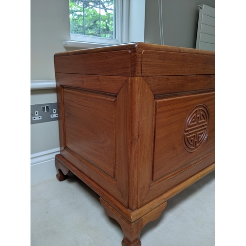 304 - A Hong Kong hardwood chest with a carved, panelled top front, 58cm high, 102cm wide
Location: A2B