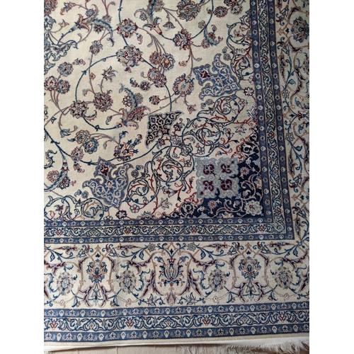 307 - A Central Persian carpet with a central medallion, pelmets and boater on a cream ground, 253cm x 360... 