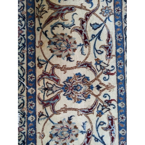 307 - A Central Persian carpet with a central medallion, pelmets and boater on a cream ground, 253cm x 360... 