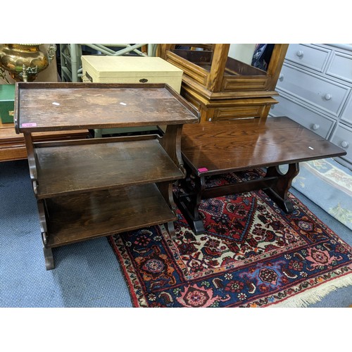 356 - A mid 20th century oak Old Charm bookcase, 87.5 h x 93w, together with a pair of oak circular topped... 