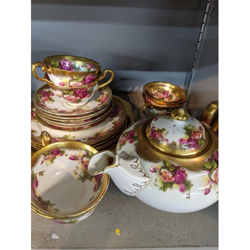 102 - A Royal Chelsea part tea set in the pattern Golden Rose, together with an Aynsley part dinner/tea se... 