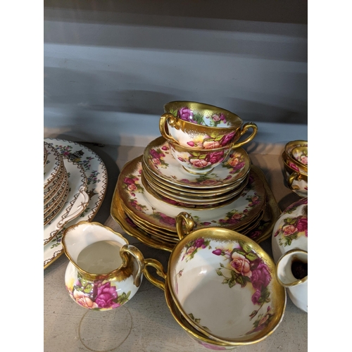 102 - A Royal Chelsea part tea set in the pattern Golden Rose, together with an Aynsley part dinner/tea se... 