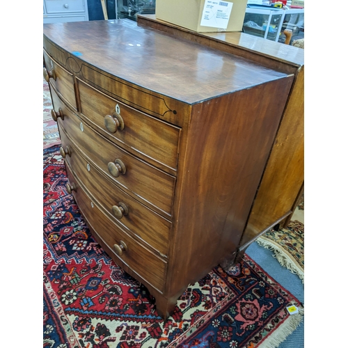 118 - An early 19th century mahogany bow fronted chest of two short and three long drawers, 103cm h x 98cm... 