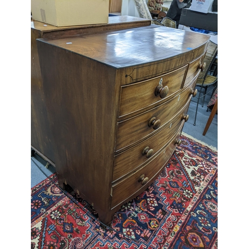 118 - An early 19th century mahogany bow fronted chest of two short and three long drawers, 103cm h x 98cm... 