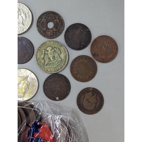 12 - A mixed lot of British and world coinage to include commemorative Crowns, 1951, Churchill and others... 