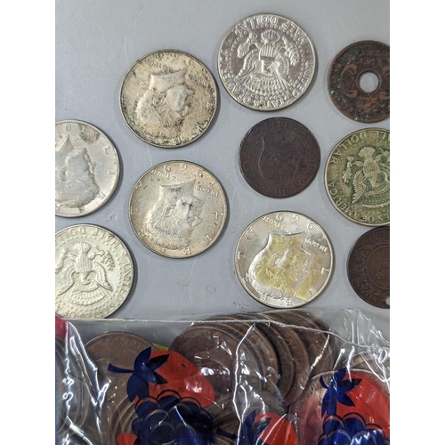 12 - A mixed lot of British and world coinage to include commemorative Crowns, 1951, Churchill and others... 