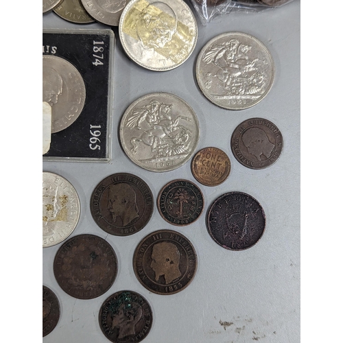 12 - A mixed lot of British and world coinage to include commemorative Crowns, 1951, Churchill and others... 