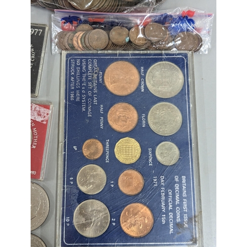 12 - A mixed lot of British and world coinage to include commemorative Crowns, 1951, Churchill and others... 