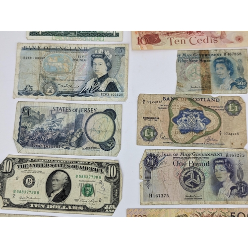 15 - A collection of 20th century banknotes to include pre-war One Pound and Ten Shilling notes, along wi... 