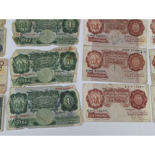 15 - A collection of 20th century banknotes to include pre-war One Pound and Ten Shilling notes, along wi... 