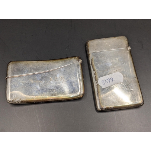 163 - Two early 20th century silver card cases to include one of arched shape, hallmarked 1902, 84g
Locati... 