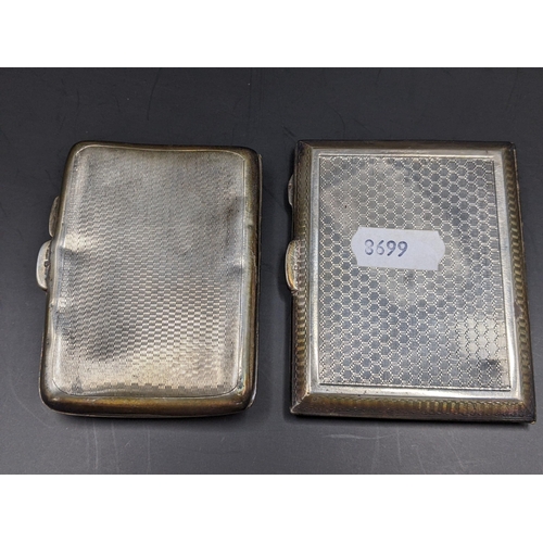 164 - Two early 20th century silver cigarette cases having engine turned decoration, one with initials, 12... 