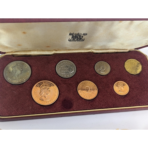 17 - A Royal Mint 1951 Specimen set to include crown, along a 1969 Seychelles seven coin set along with a... 