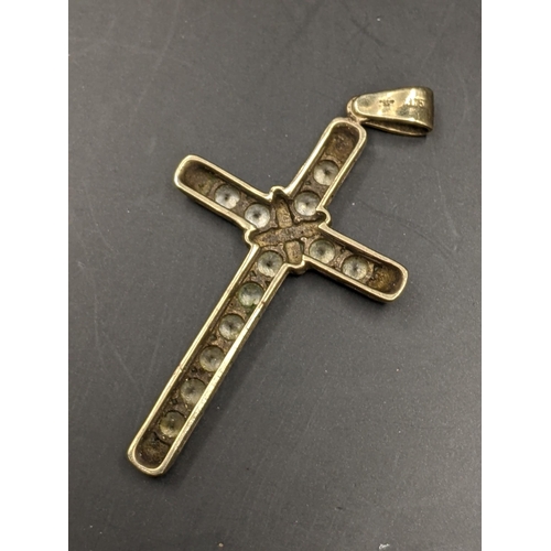 185 - A 9ct gold cross shaped pendant inset with paste stones, 6.6g
Location:CAB2