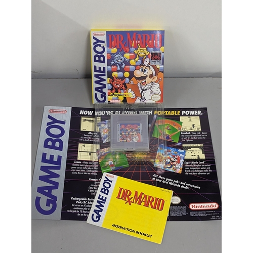 191 - Mixed vintage game systems and games to include a boxed Nintendo Game Boy with Alex Kidd in Miracle ... 