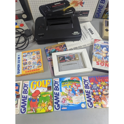 191 - Mixed vintage game systems and games to include a boxed Nintendo Game Boy with Alex Kidd in Miracle ... 