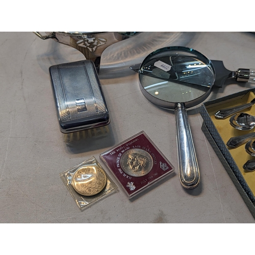 195 - Silver plate to include a tea set, flatware, silver handled knives, a magnifying glass and other ite... 