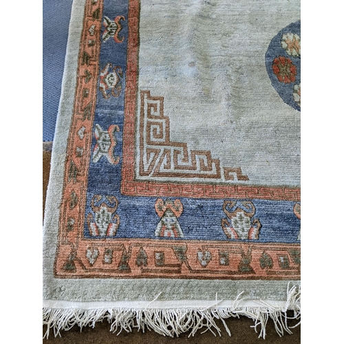 206 - A handmade Chinese carpet with geometric motifs in pastel colours
Location:A1B