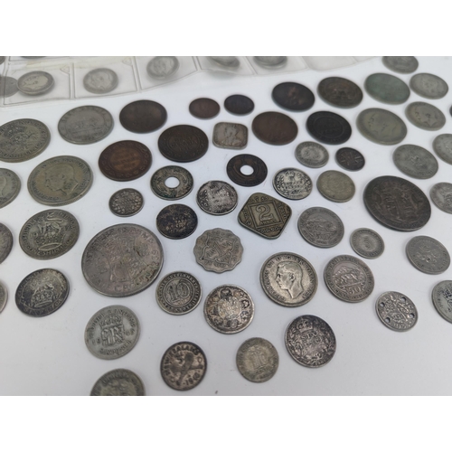 21 - A quantity of early 20th century and later British and Colonial coinage to include 1904 1/4 Rupee an... 