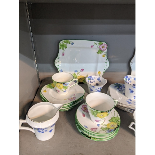 221 - An early 20th century hand painted floral tea set and a Colclough No 4117 tea set
Location:4.4