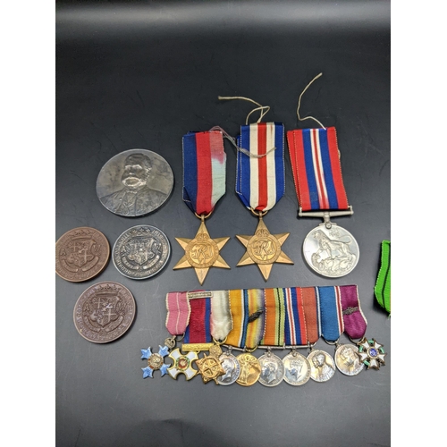 231 - WWI and later miniatures to include Legion of Merit, Distinguished service order, military MBE and o... 