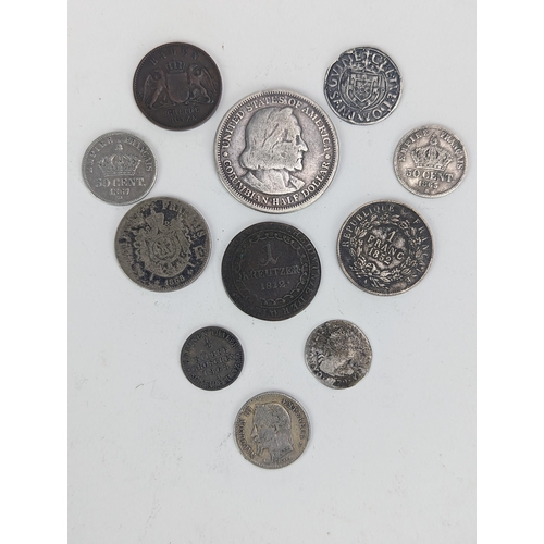 25 - A group of 19th century and other coinage to include napoleon III 1 Franc 1852, 1868 and 1865 5 cent... 