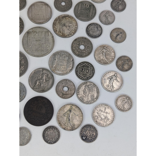 27 - A group of late 19th/early 20th century silver and other coinage to include 1872 one Franc, 1872 50 ... 