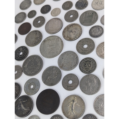 27 - A group of late 19th/early 20th century silver and other coinage to include 1872 one Franc, 1872 50 ... 