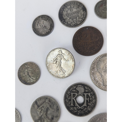 27 - A group of late 19th/early 20th century silver and other coinage to include 1872 one Franc, 1872 50 ... 