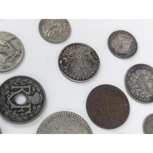 27 - A group of late 19th/early 20th century silver and other coinage to include 1872 one Franc, 1872 50 ... 