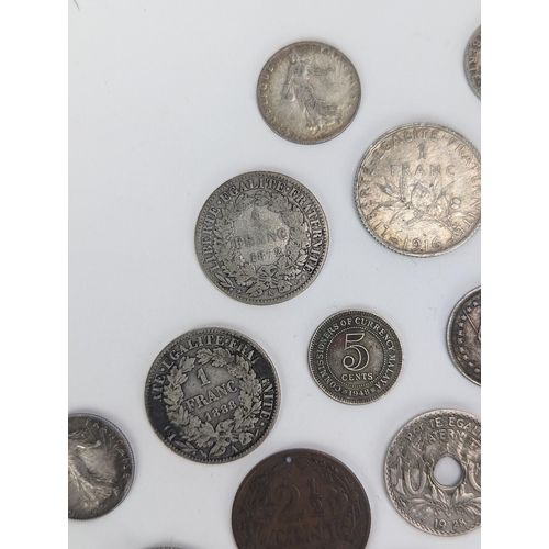 27 - A group of late 19th/early 20th century silver and other coinage to include 1872 one Franc, 1872 50 ... 