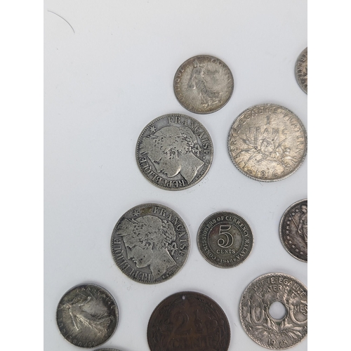 27 - A group of late 19th/early 20th century silver and other coinage to include 1872 one Franc, 1872 50 ... 