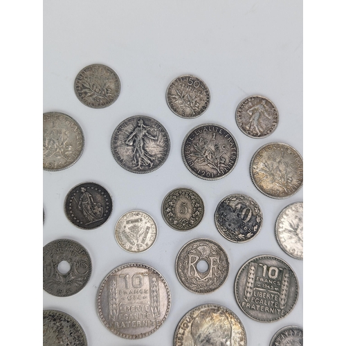 27 - A group of late 19th/early 20th century silver and other coinage to include 1872 one Franc, 1872 50 ... 