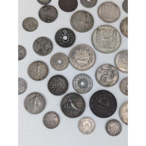 27 - A group of late 19th/early 20th century silver and other coinage to include 1872 one Franc, 1872 50 ... 