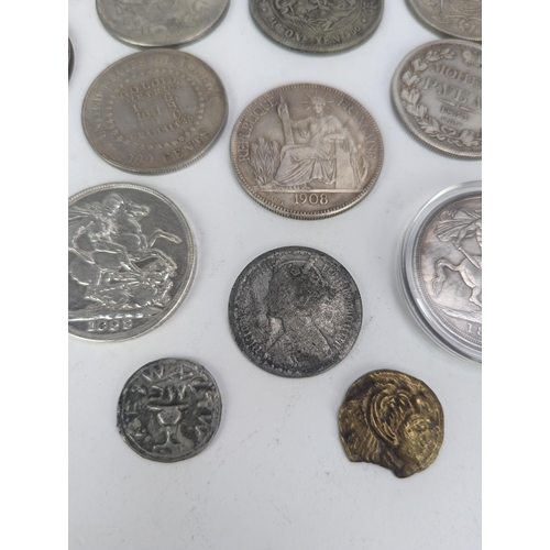 29 - A group of Replica coins to include 1833 Russian Rubel, 'Junk Dollar', 1879 Goloid 100 cents, 1911 T... 