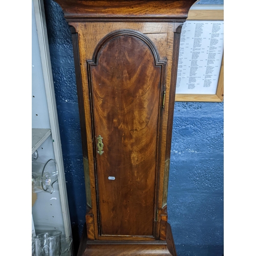 310 - A George III mahogany 8 day longcase clock having pierced fretwork and arched top dial signed 'Thoma... 