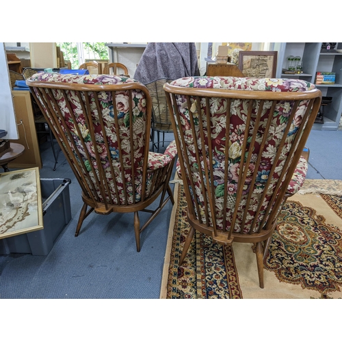 317 - A pair of stained beech framed Ercol Winsor armchairs with floral upholstery
Location:A4B