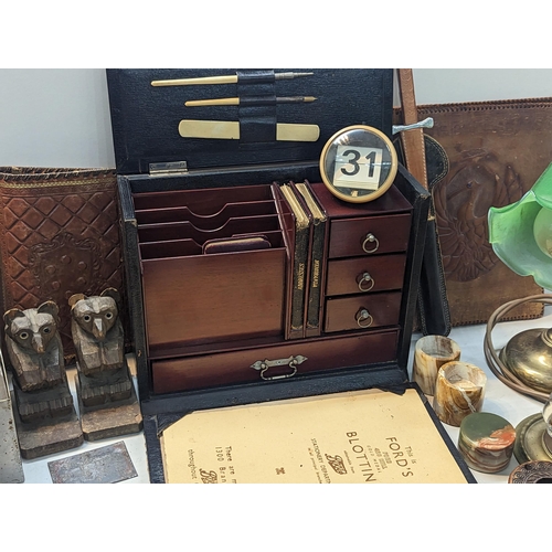 320 - A mixed lot to include an early 20th century travel stationary A/F, brass lamp, vintage tins, Egypti... 