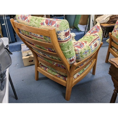 328 - A pair of Ercol elm stained armchairs 
Location:LAF