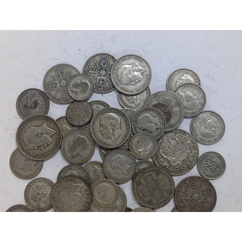 33 - Mixed British pre 1947 half crowns, Florins and Shillings, along with a 1873 1886 three pence and a ... 