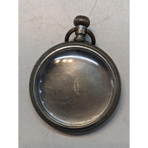 387 - A group of three pocket watches to include a Hamilton having a black dial and subsidiary dials, a Ro... 